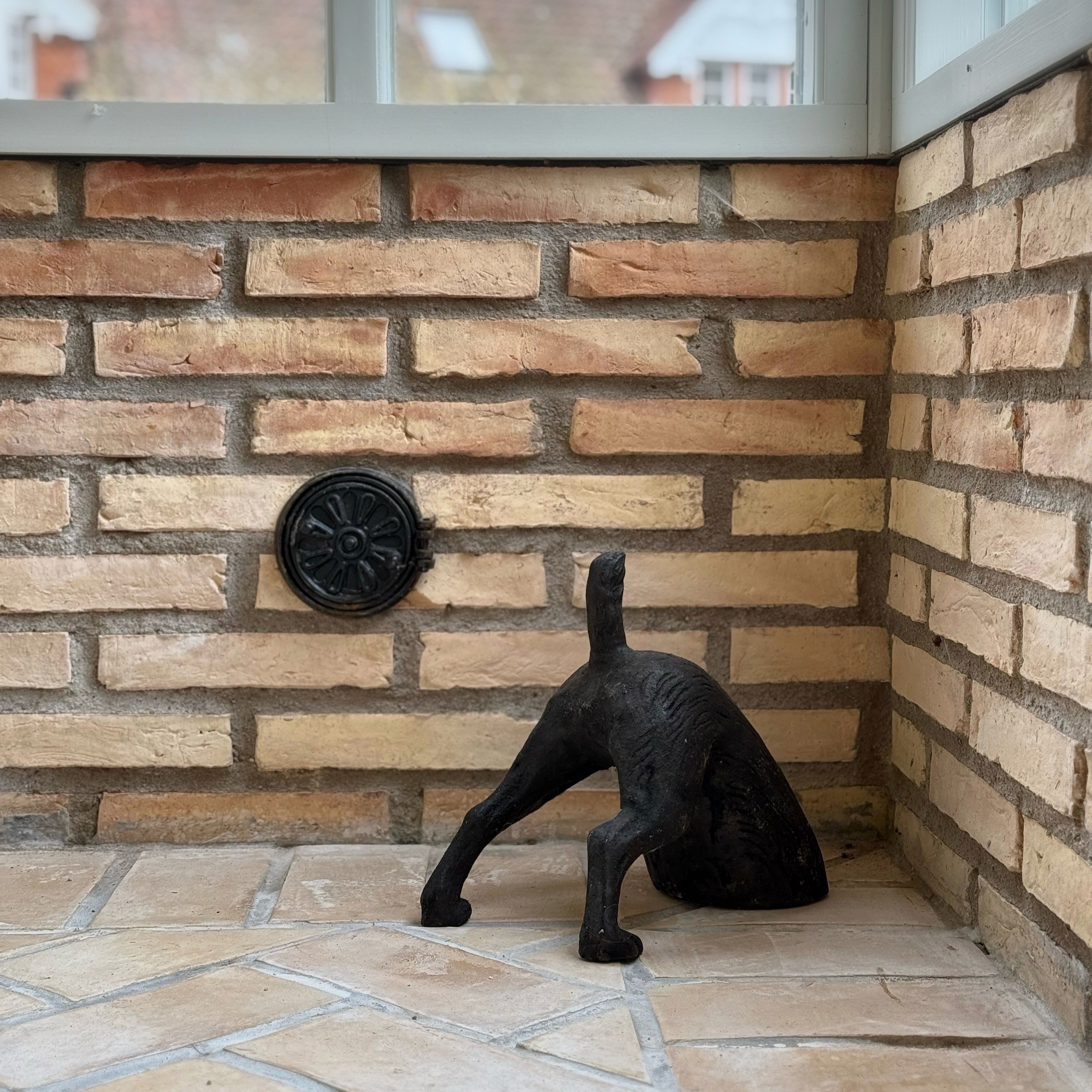 Dörrstopp hund gjutjärn