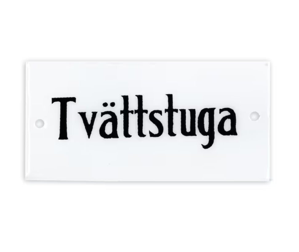 Skylt Tvättstuga
