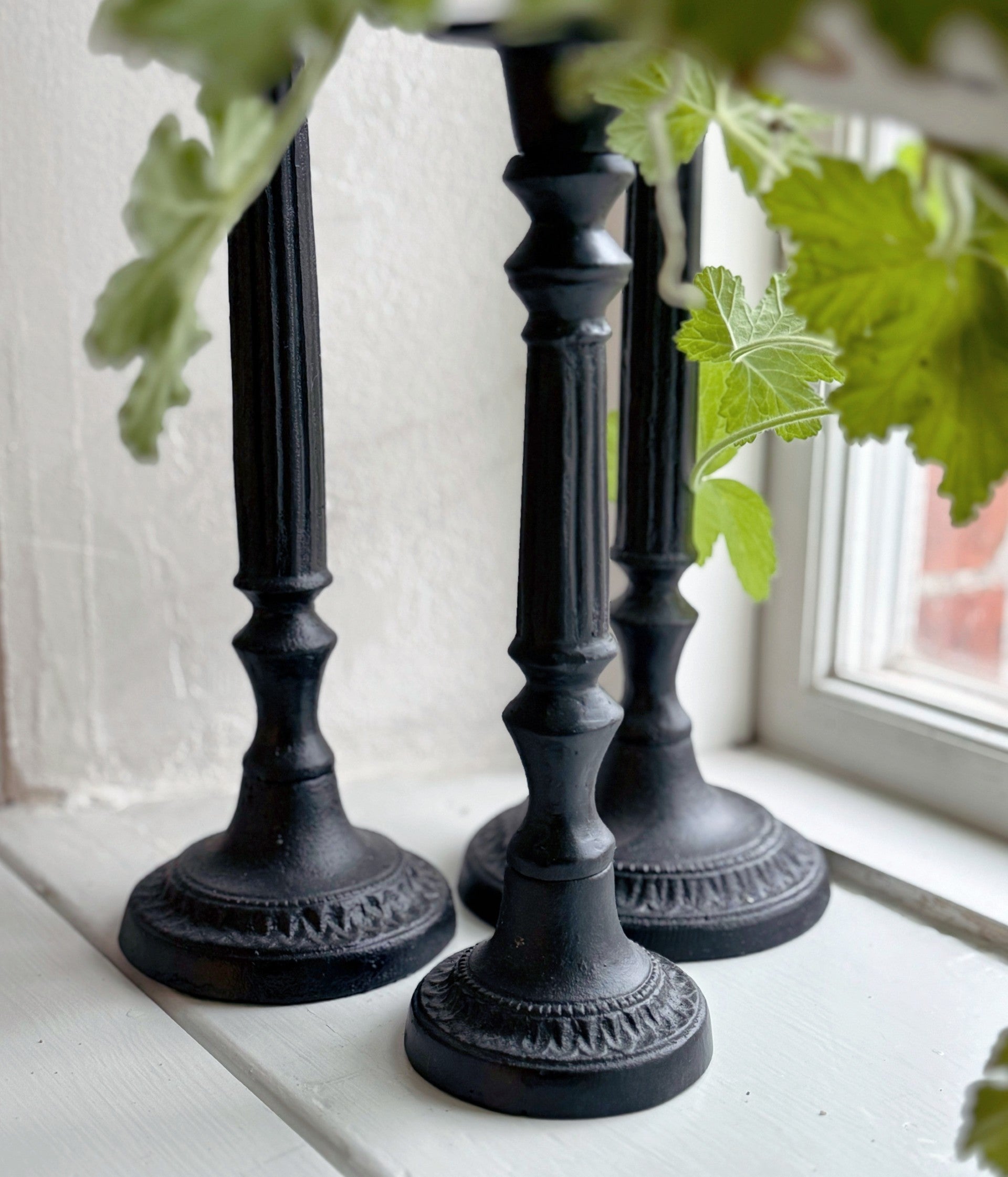 Ljusstake gjutjärn mellan